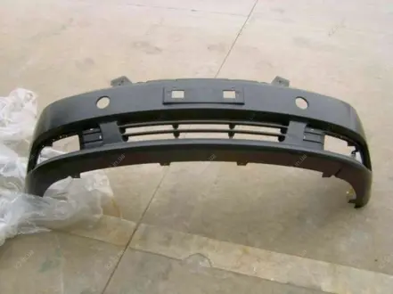 Бампер передній (пластик, чорний, чи не фарбований) Aftermarket 1068001651