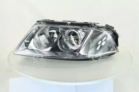 Фара лев. VW PASSAT B5 00-05 TYC 20-6244-05-2B