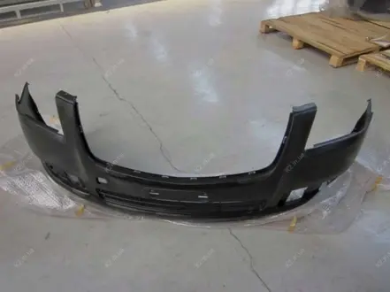 Бампер передний, без парктроника (пластик, черный, а не крашеный) Aftermarket 1018009779