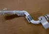 Трубка масляного радиатора металл. Geely EC-8 Aftermarket 1016010375 (фото 1)