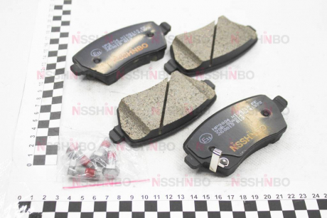 Колодки тормозные дисковые передние Nissan Micra, Note 1.2, 1.5 (06 -) / Suzuki Splash, Swift 1.2, 1.3, 1.5 (05-) NISSHINBO NP9004 (фото 1)