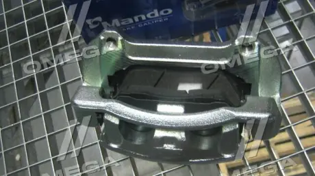Суппорт тормозной MANDO EX581102B700